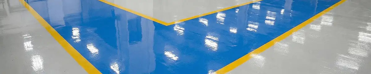 A factory floor professionally covered and marked with epoxy flooring in Jacksonville, FL